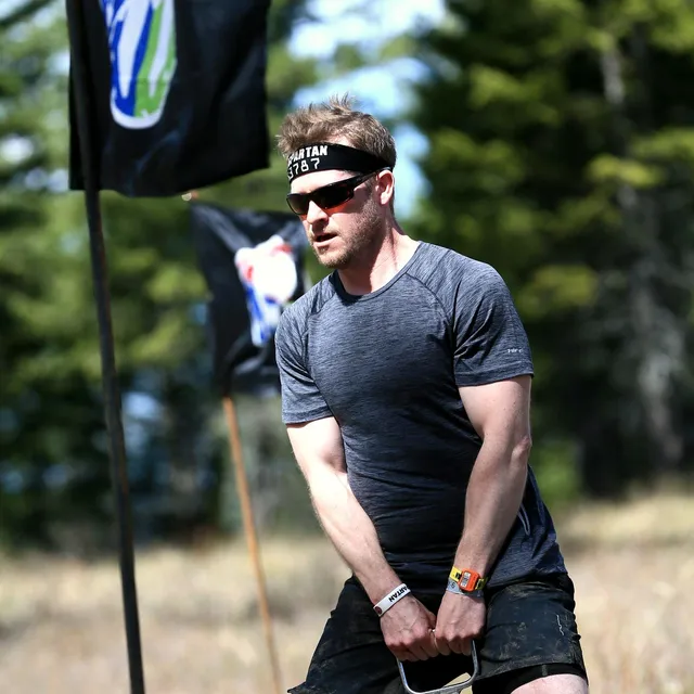 Josh Cypher competing in a Spartan race